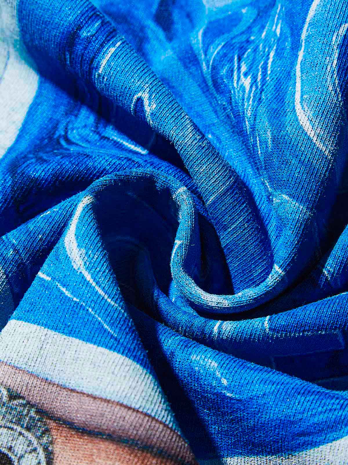 Texture shot of the black heavyweight cotton fabric showing smooth quality