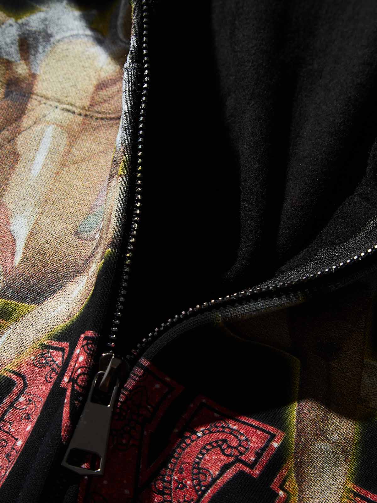 Texture shot of the ultra-warm black fleece lining and metal zipper detail
