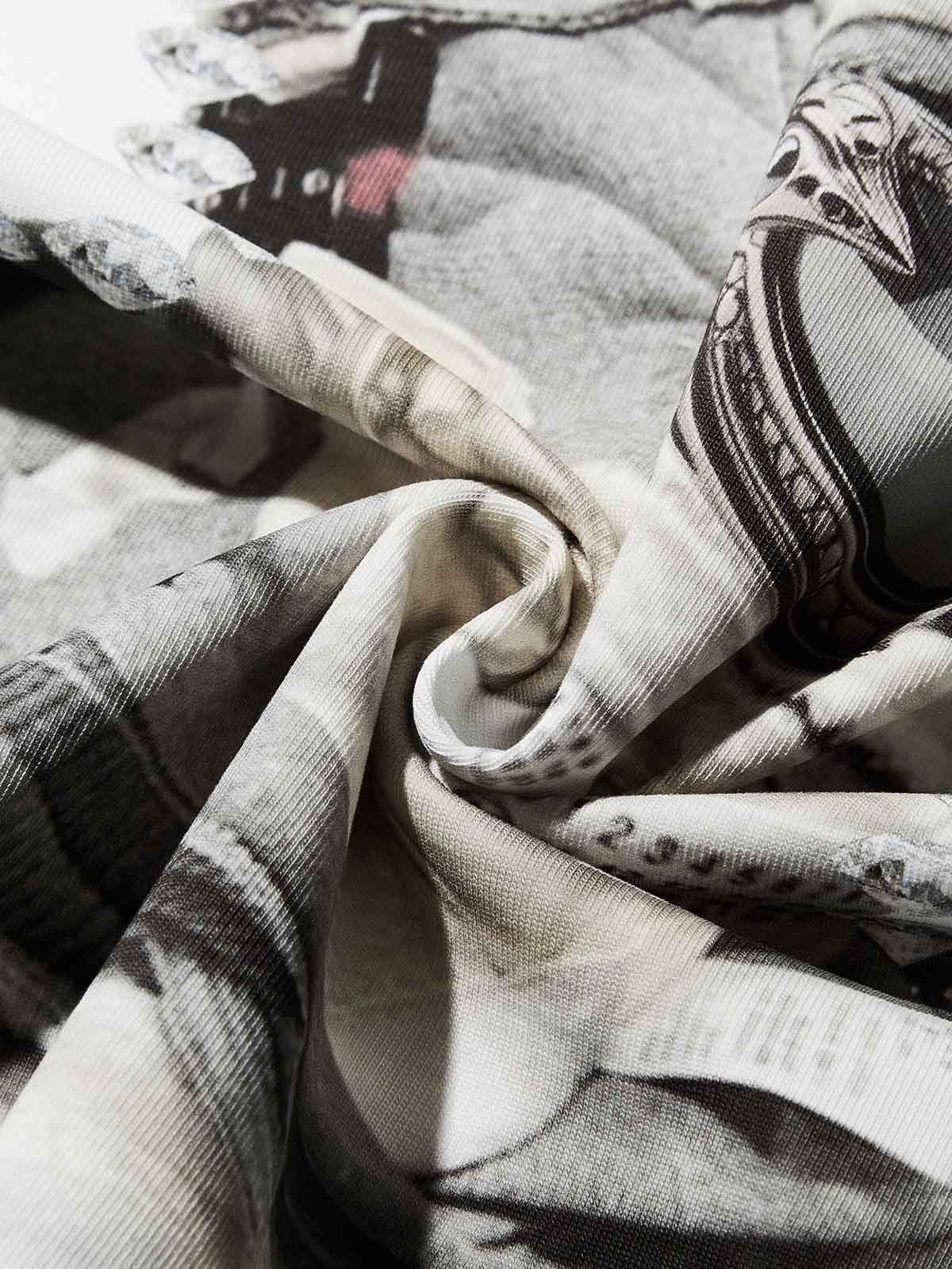 Texture shot showing the stone-style NOISSEY logo at the bottom of the mask graphic