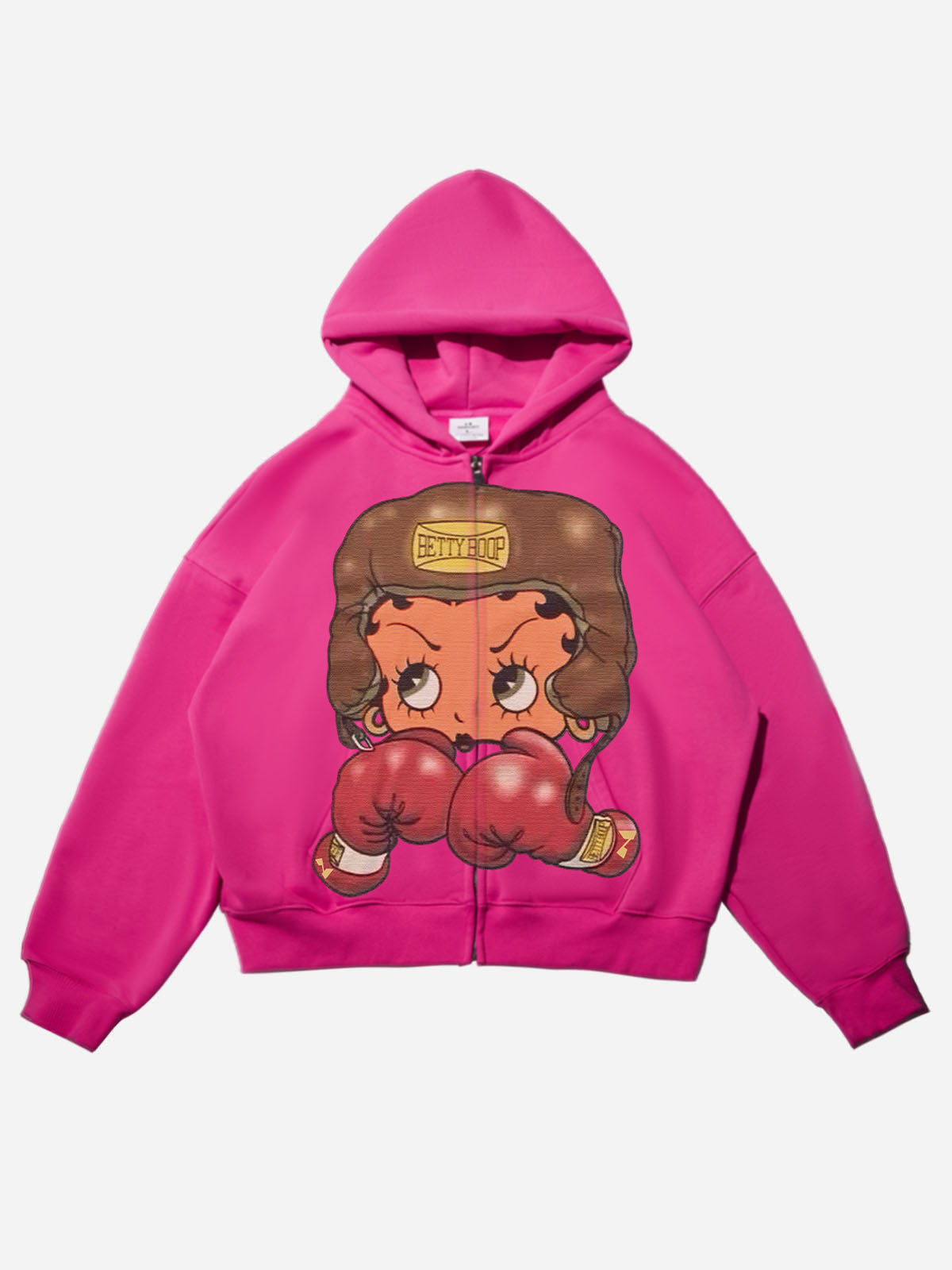 Vibrant pink boxy zip-up hoodie featuring a large Betty Boop boxing graphic on the front.