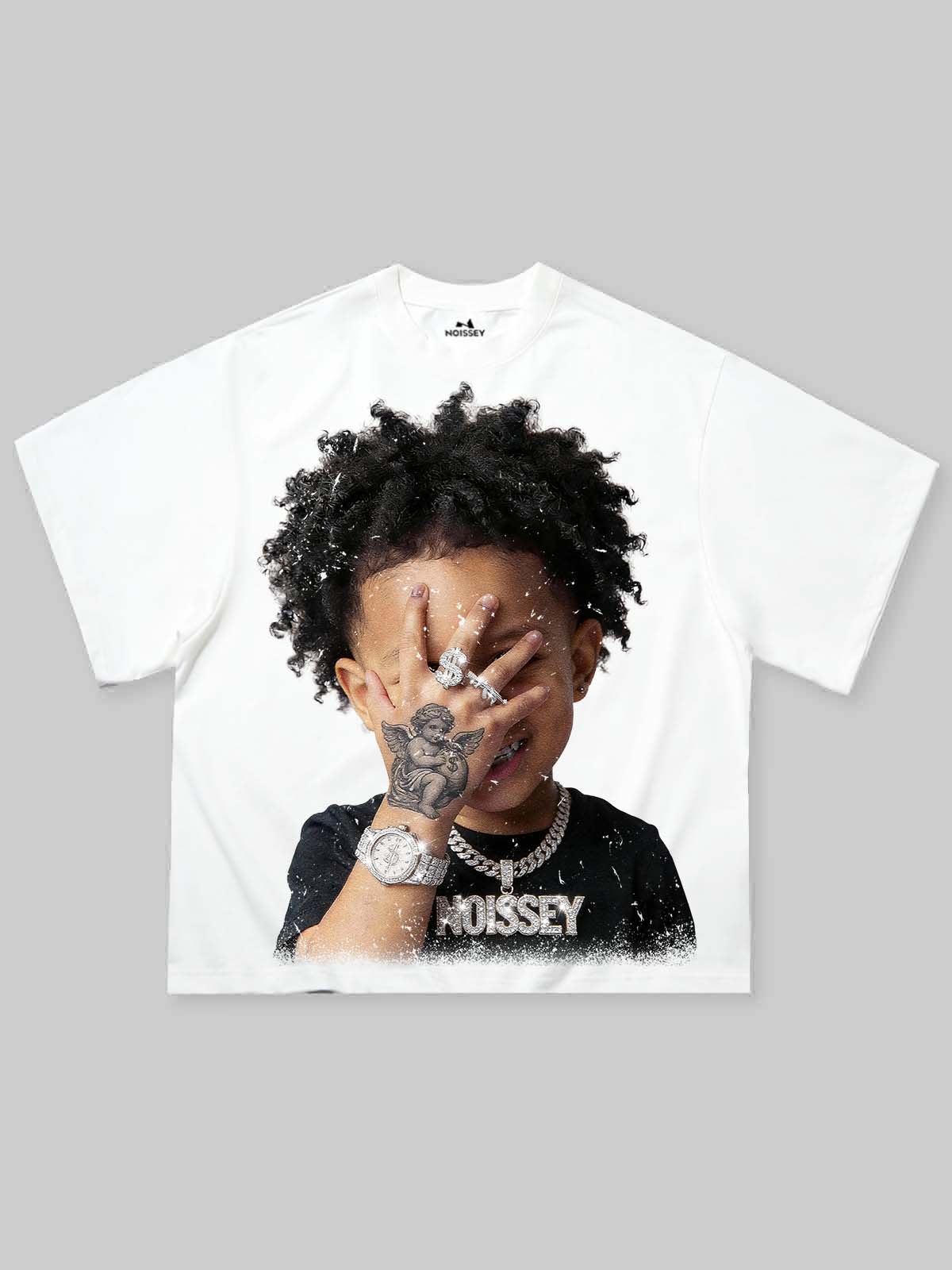 White oversized t-shirt featuring a graphic print of a child covering their face with a tattooed hand wearing luxury jewelry.