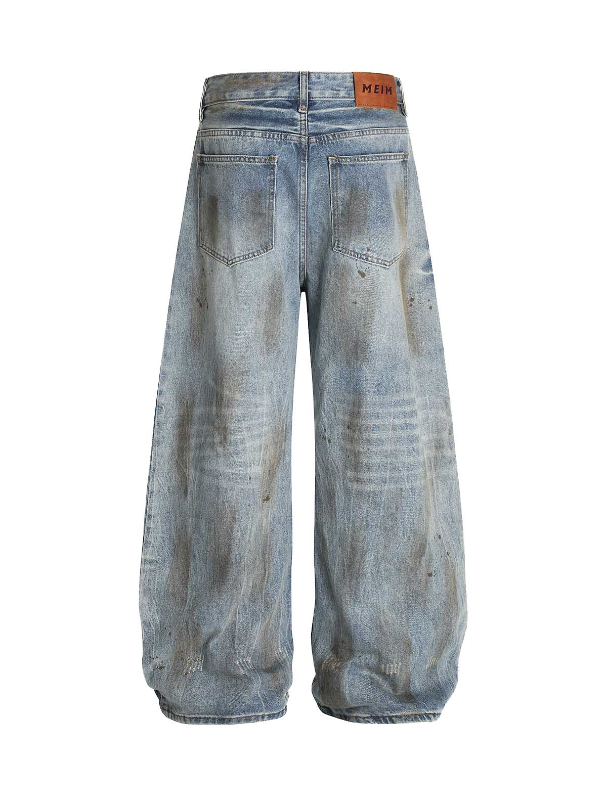 Distressed Ripped Machete-Cut Jeans