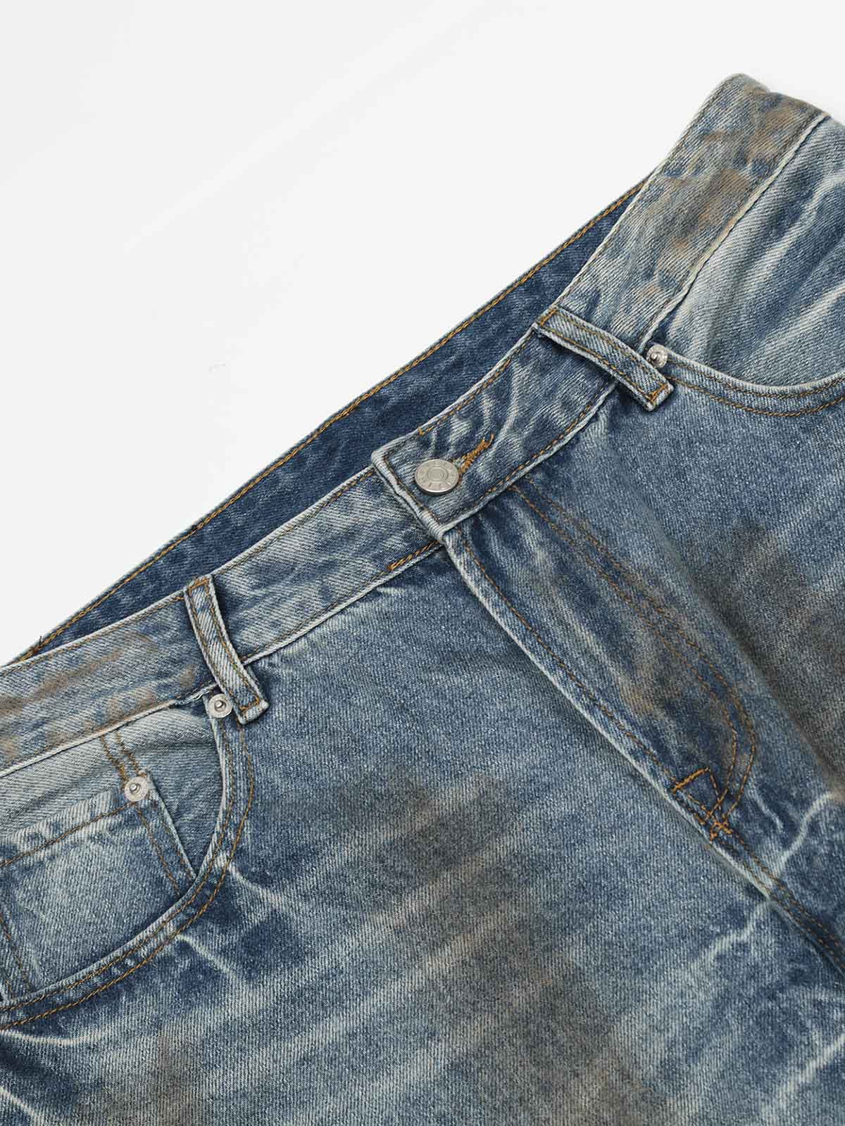 Distressed Ripped Machete-Cut Jeans