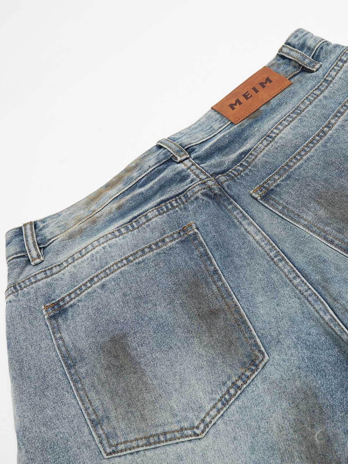 Distressed Ripped Machete-Cut Jeans