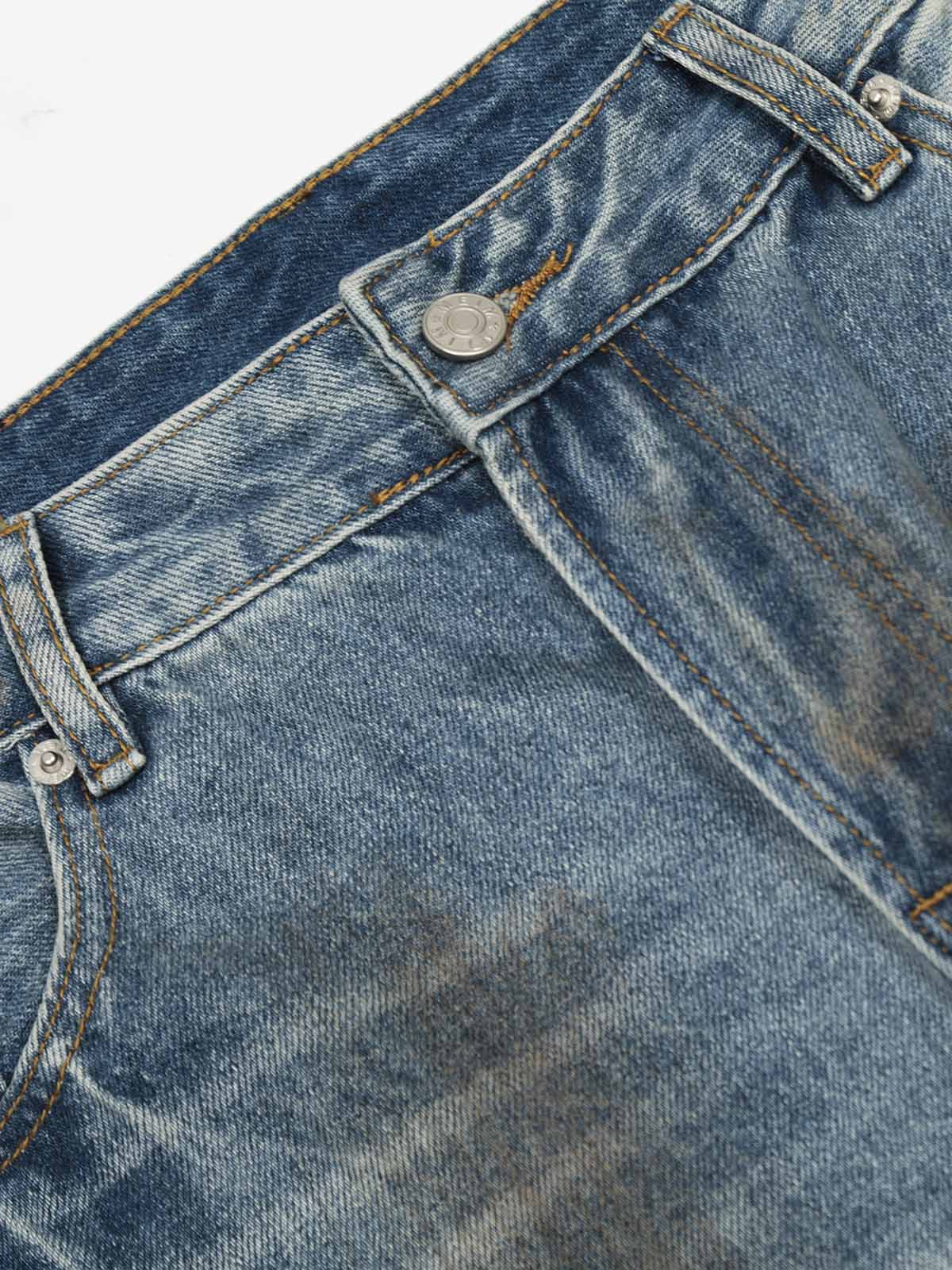 Distressed Ripped Machete-Cut Jeans