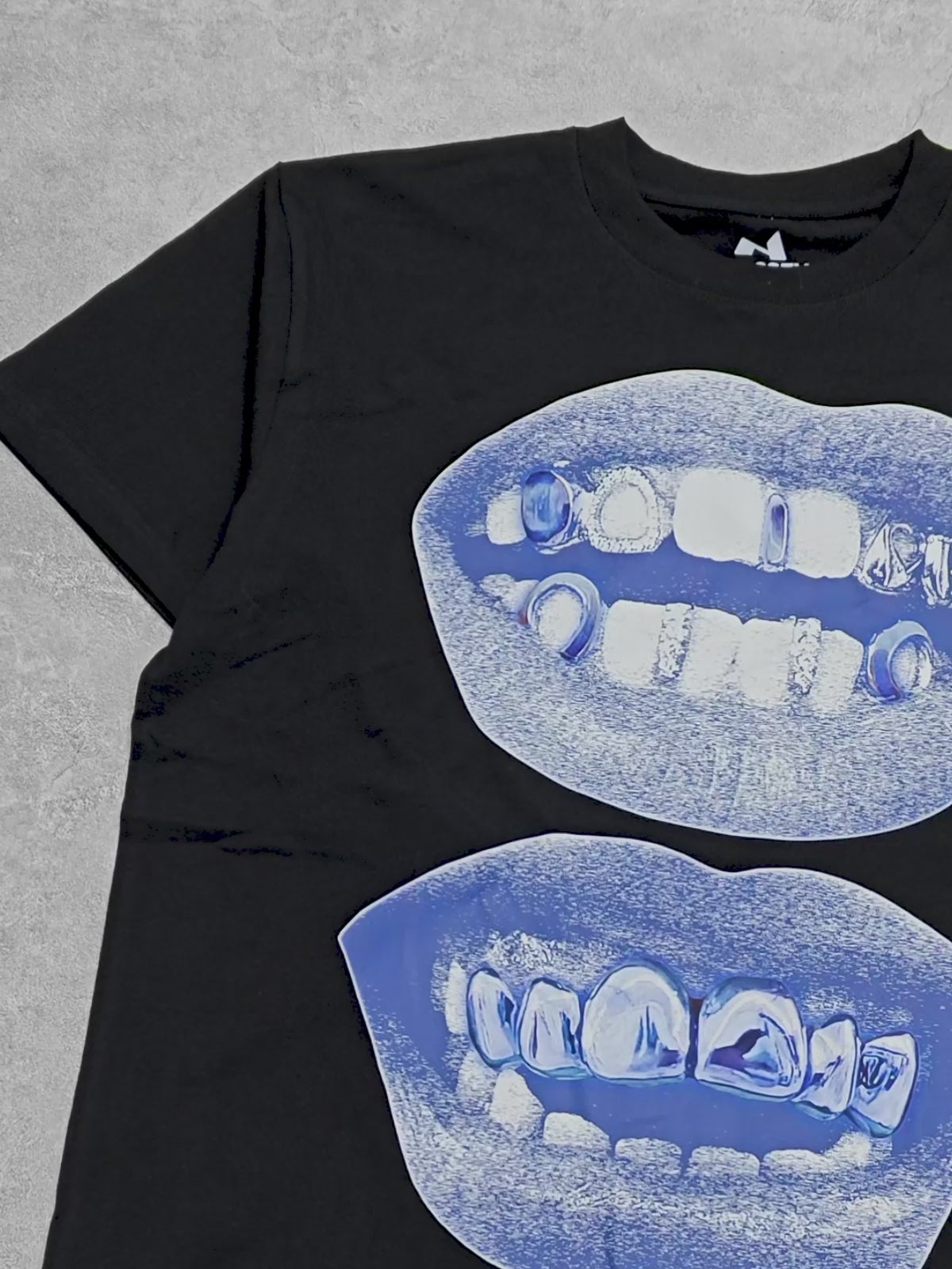 BOUNCE BACK© Retro Blue Lips Grills Black Print Tee