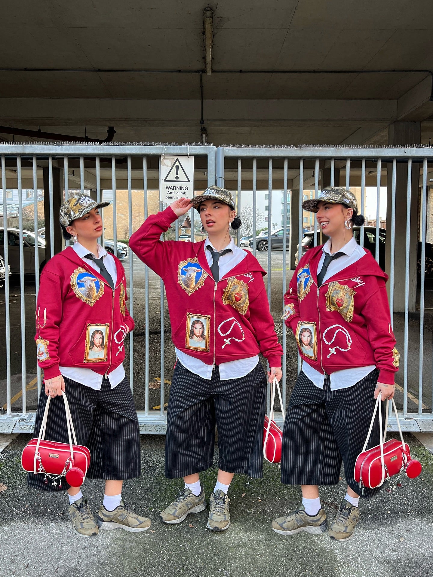 Red Hoodie Adorned with Religious Icons